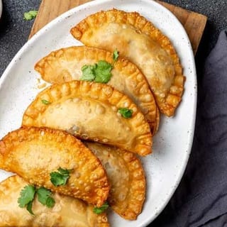 2 Steak Cheese Empanadas